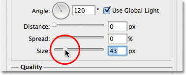 Dragging the Size slider in the Drop Shadow layer style options. Image &copy; 2012 Photoshop Essentials.com.