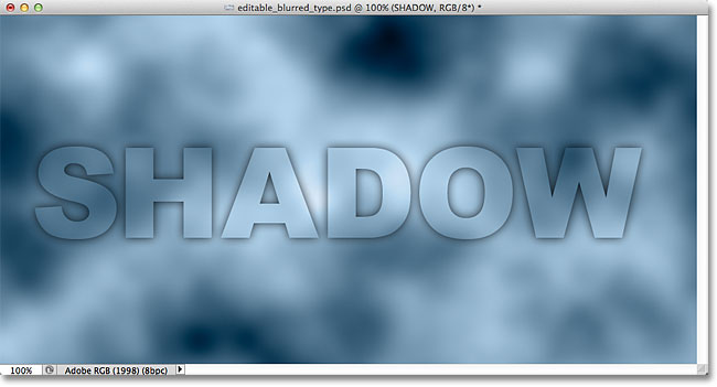 The image after lowering the Fill Opacity of the text. Image &copy; 2012 Photoshop Essentials.com.