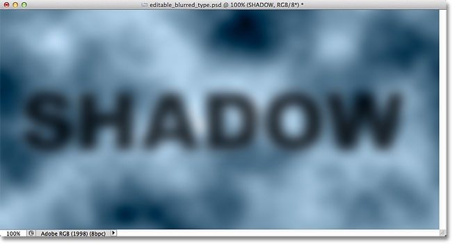 The text appears blurrier after increasing the Size value. Image &copy; 2012 Photoshop Essentials.com.