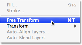 Memilih perintah Free Transform dalam Photoshop. Gambar © 2009 Photoshop Essentials.com.