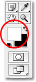 Swapping the Foreground and Background colors in Photoshop. Image © 2009 Photoshop Essentials.com.