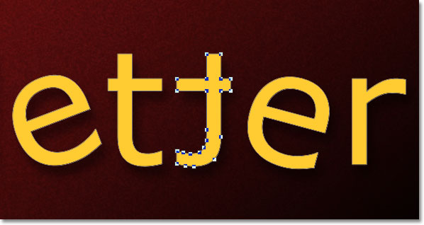 The letter in the word has been flipped horizontally. Image &copy; 2011 Photoshop Essentials.com.