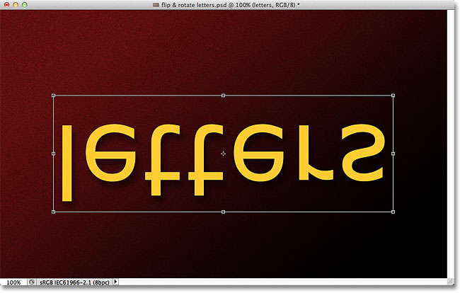 Photoshop text flipped vertically in the document. Image &copy; 2011 Photoshop Essentials.com.