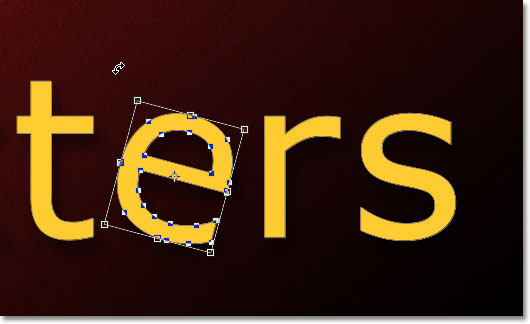 Rotating the second letter 'e' with Free Transform. Image &copy; 2011 Photoshop Essentials.com.