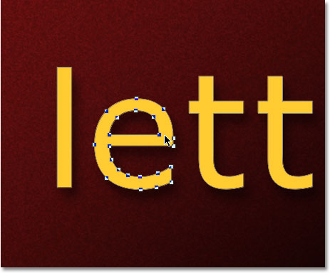 Selecting the letter 'e' in the word with the Path Selection Tool. Image &copy; 2011 Photoshop Essentials.com.