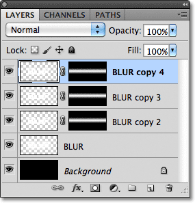 Making another copy of the blurred text layer. Image &copy; 2011 Photoshop Essentials.com.