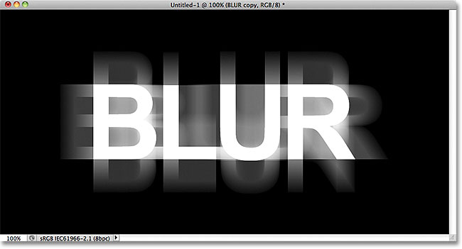 Horizontal and vertical motion blur has been added to the text. Image &copy; 2011 Photoshop Essentials.com.