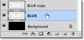 Selecting the original text layer in the Layers panel. Image &copy; 2011 Photoshop Essentials.com.