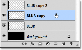 Selecting the copy of the text layer. Image &copy; 2011 Photoshop Essentials.com.