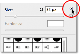 Clicking the menu icon in the Brush Picker in Photoshop. Image &copy; 2011 Photoshop Essentials.com