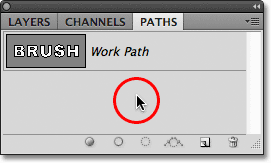 Clicking in an empty area in the Paths panel to hide the path in the document. Image &copy; 2011 Photoshop Essentials.com