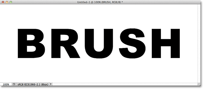 The original Photoshop document containing the word 'Brush' on a Type layer. Image &copy; 2011 Photoshop Essentials.com