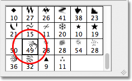Selecting Starburst Large brush from the Brush Picker in Photoshop. Image &copy; 2011 Photoshop Essentials.com