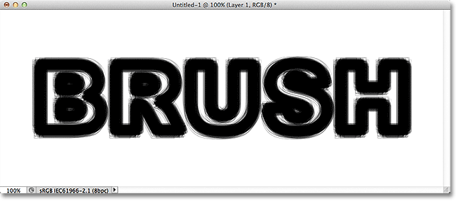 A stroke applied to a text path using a Spatter brush in Photoshop. Image &copy; 2011 Photoshop Essentials.com