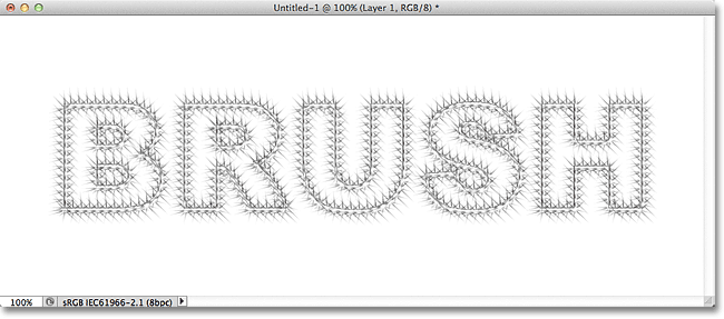 A stroke applied to a text path using the Starburst - Large brush in Photoshop. Image &copy; 2011 Photoshop Essentials.com