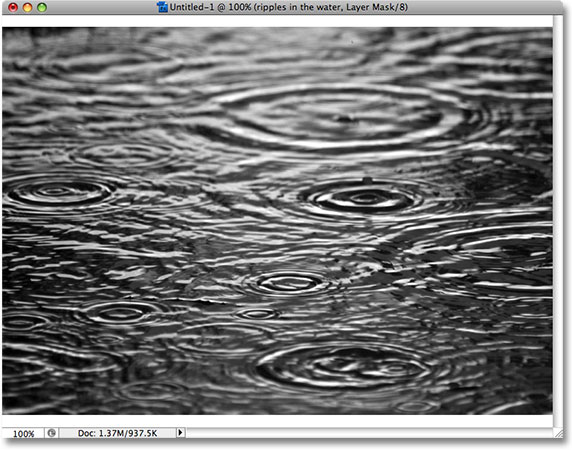 The texture photo appears in black and white inside the layer mask.