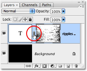The link icon between the type layer thumbnail and the layer mask thumbnail. Image © 2009 Photoshop Essentials.com.