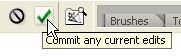 The Commit and Cancel icons, visible only when typing or editing type in the document.